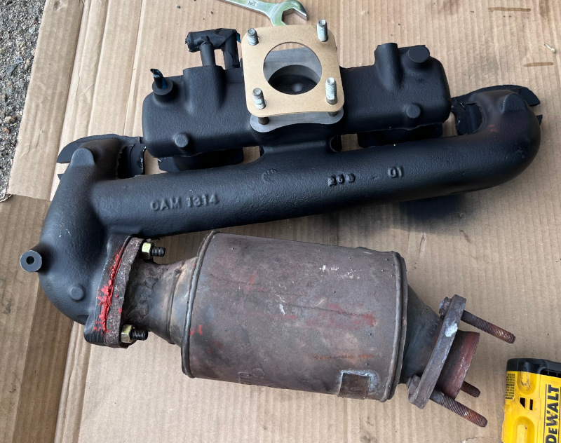 A photo of the manifold and catalytic converter mated and ready for installation.
